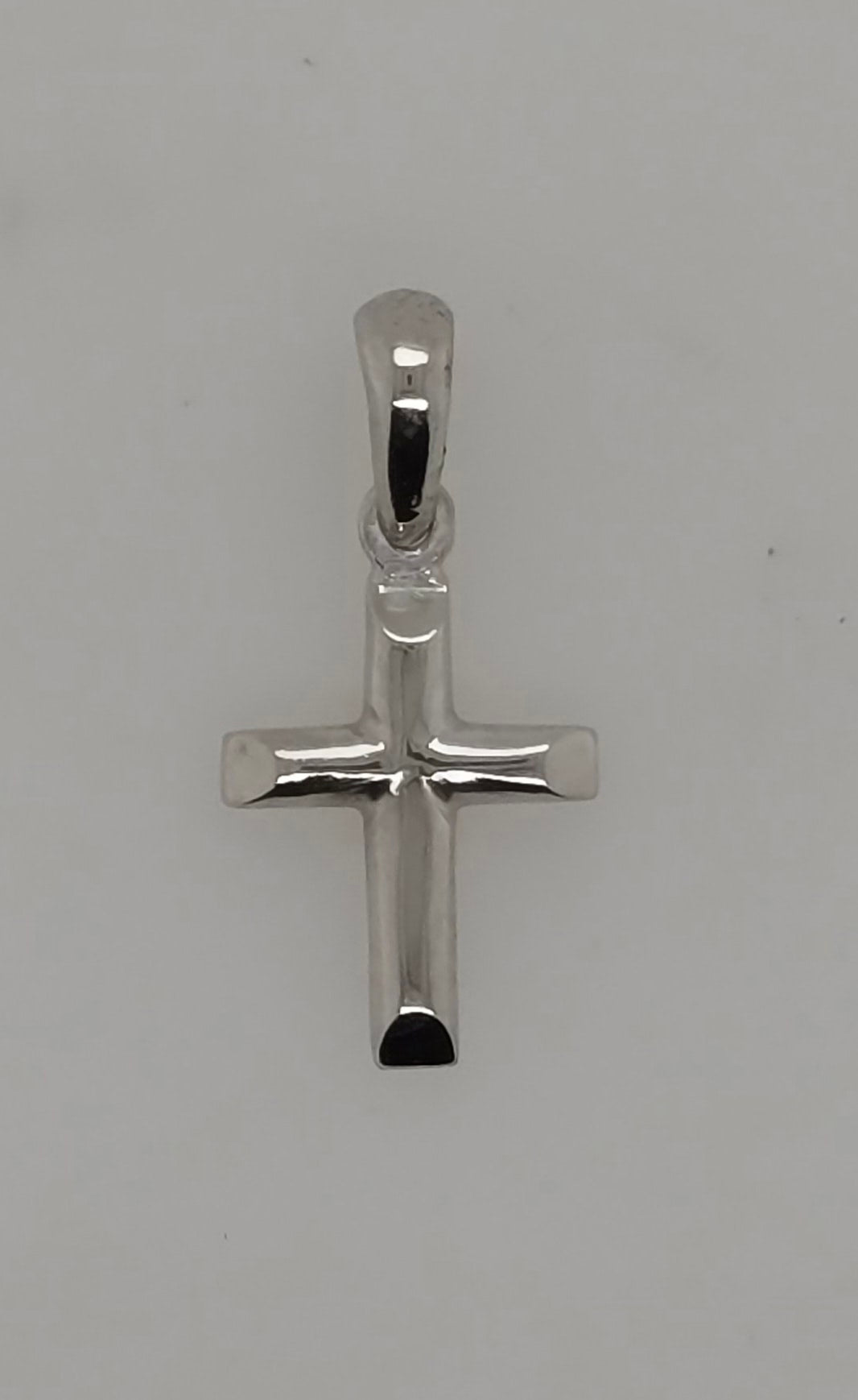 9CT WHITE GOLD IMPORTED SMALL CROSS