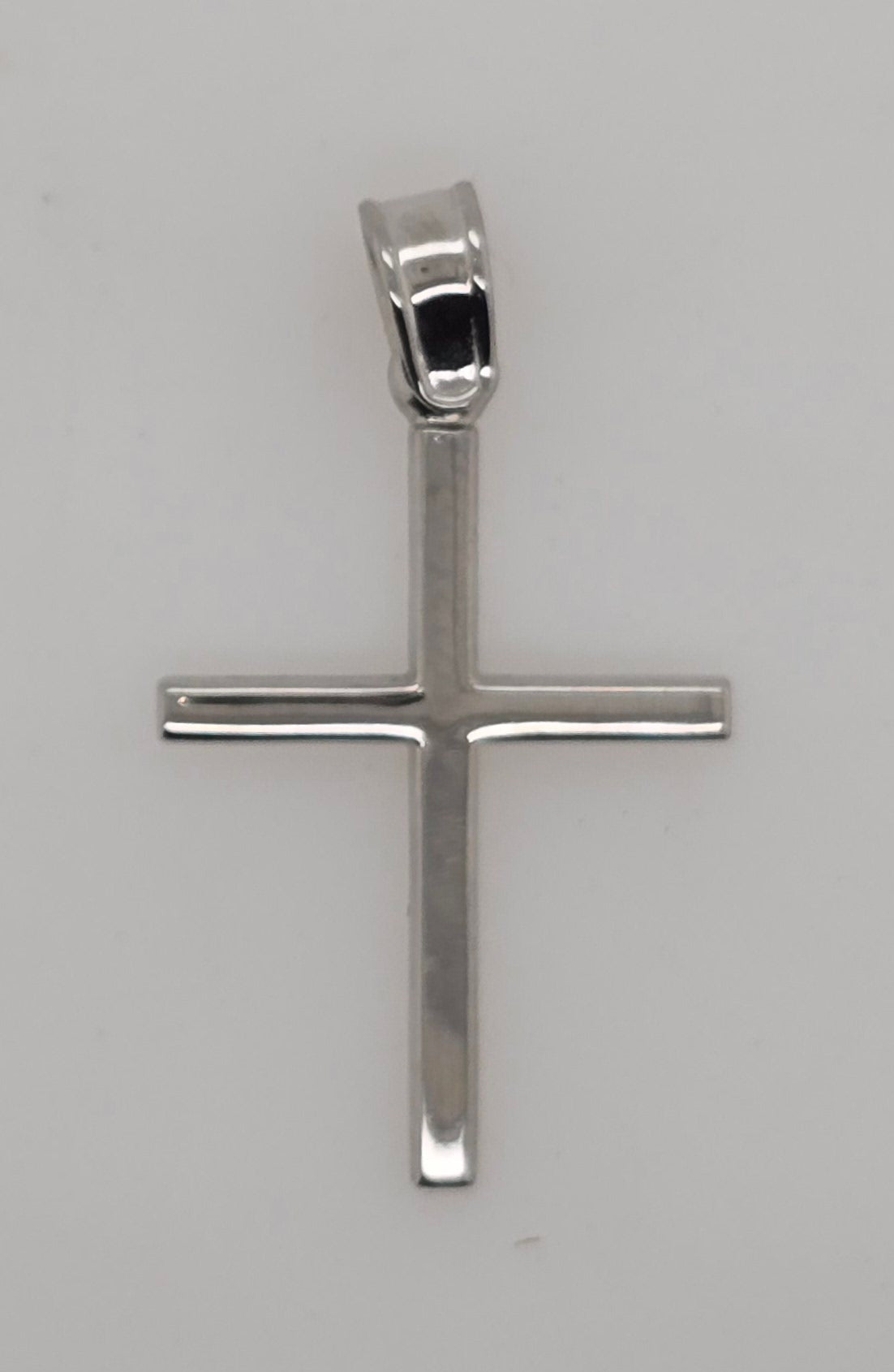 9CT WHITE GOLD IMPORTED MEDIUM POLISHED CROSS