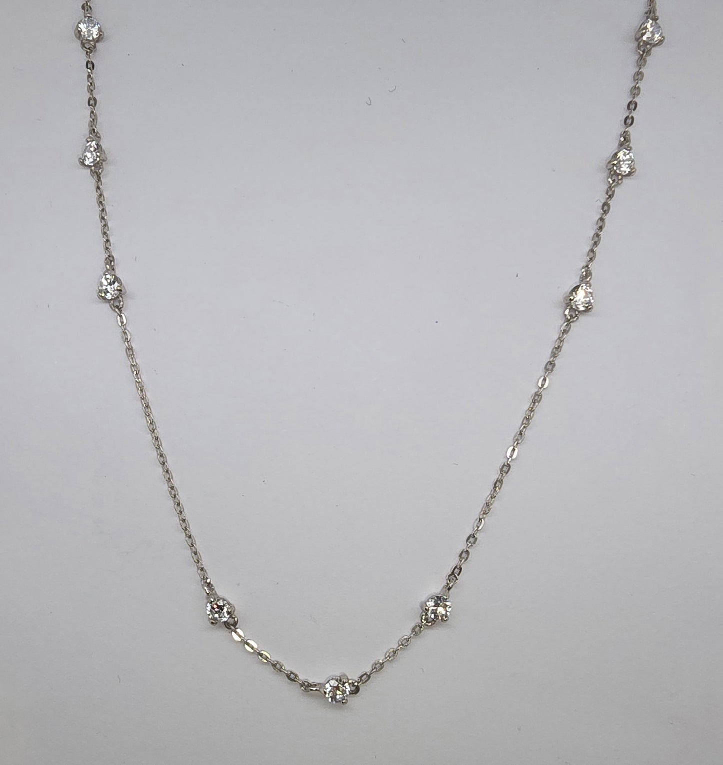 9CT WHITE GOLD 9 X 2.5MM ROUND CUBIC ZIRCONIA 45CM NECKLACE.