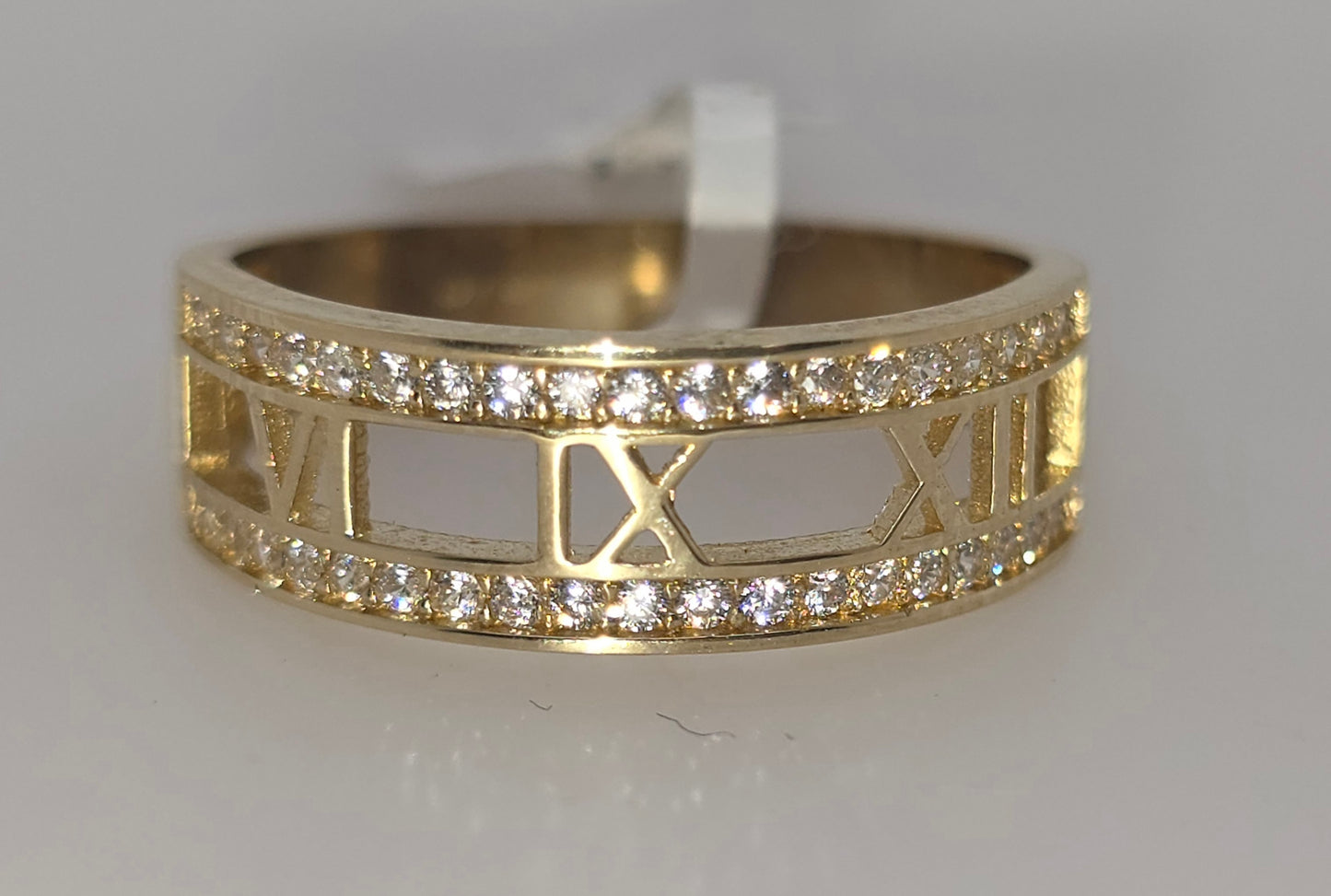 9CT YELLOW GOLD IMPORTED CZ 6.5MM ROMAN NUMERAL RING.