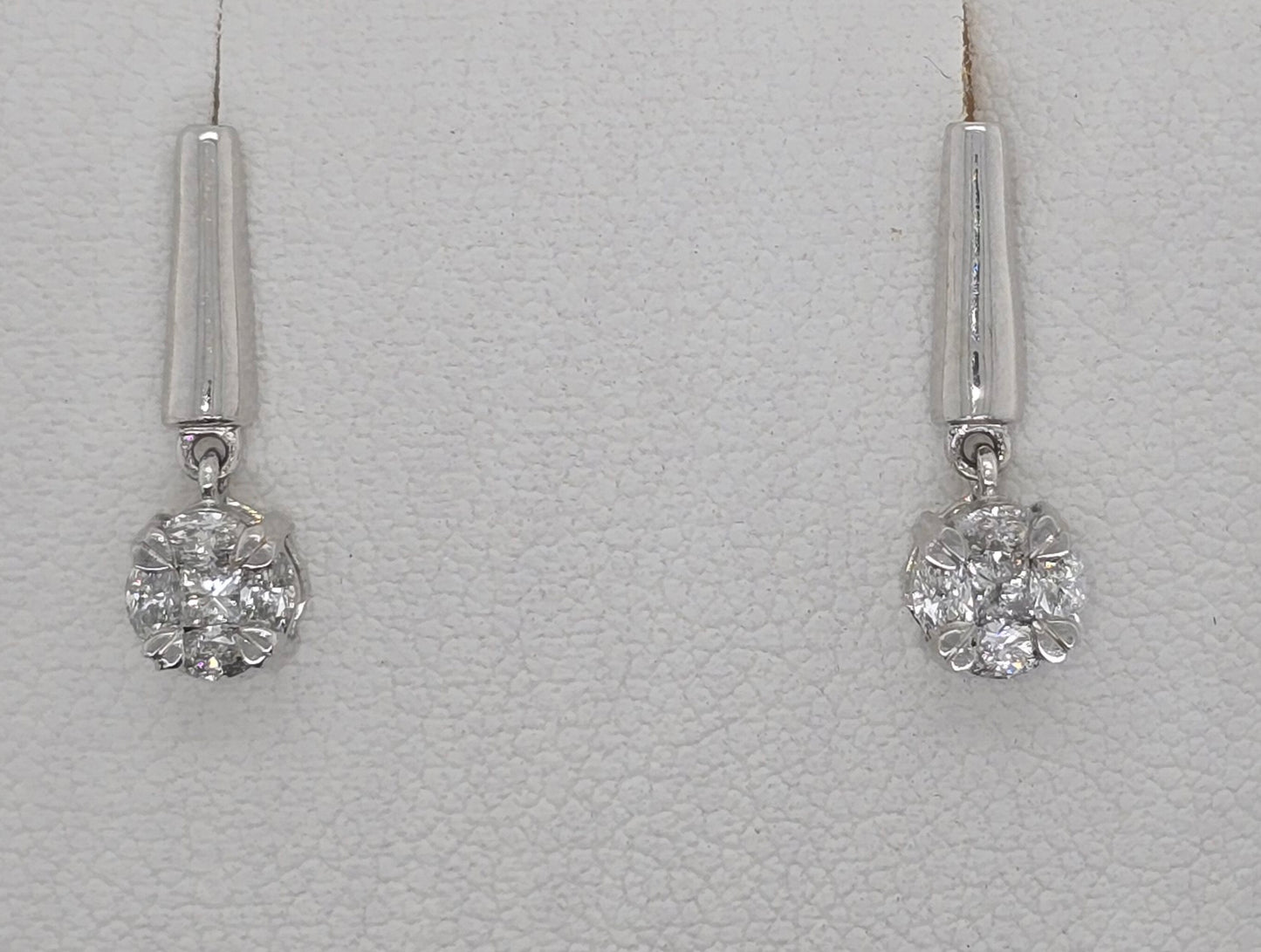 9CT WHITE GOLD DROP CLUSTER DIAMOND STUD EARRINGS.