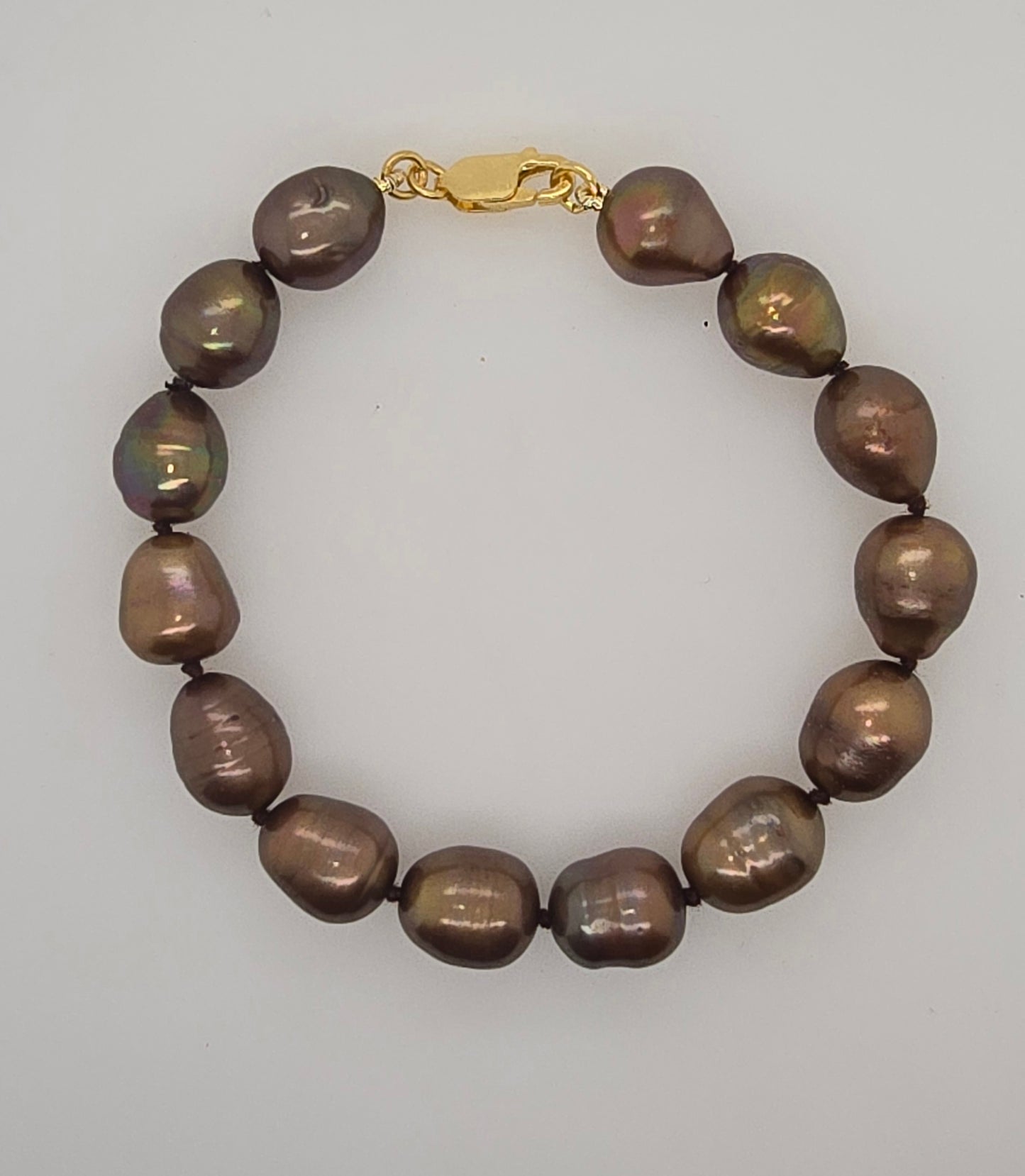 FRESHWATER 9.5MM X 12MM BROWN PEARL 19CM BRACELET GOLD PLATED CLASP.