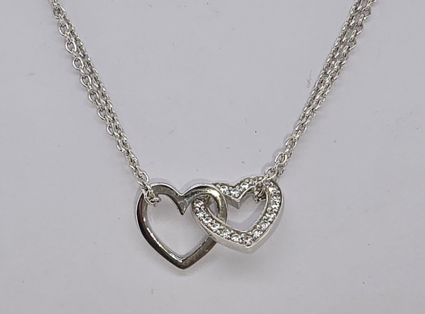 ELLANI STERLING SILVER DOUBLE CHAIN NECKLACE WITH LINKED HEARTS. P742