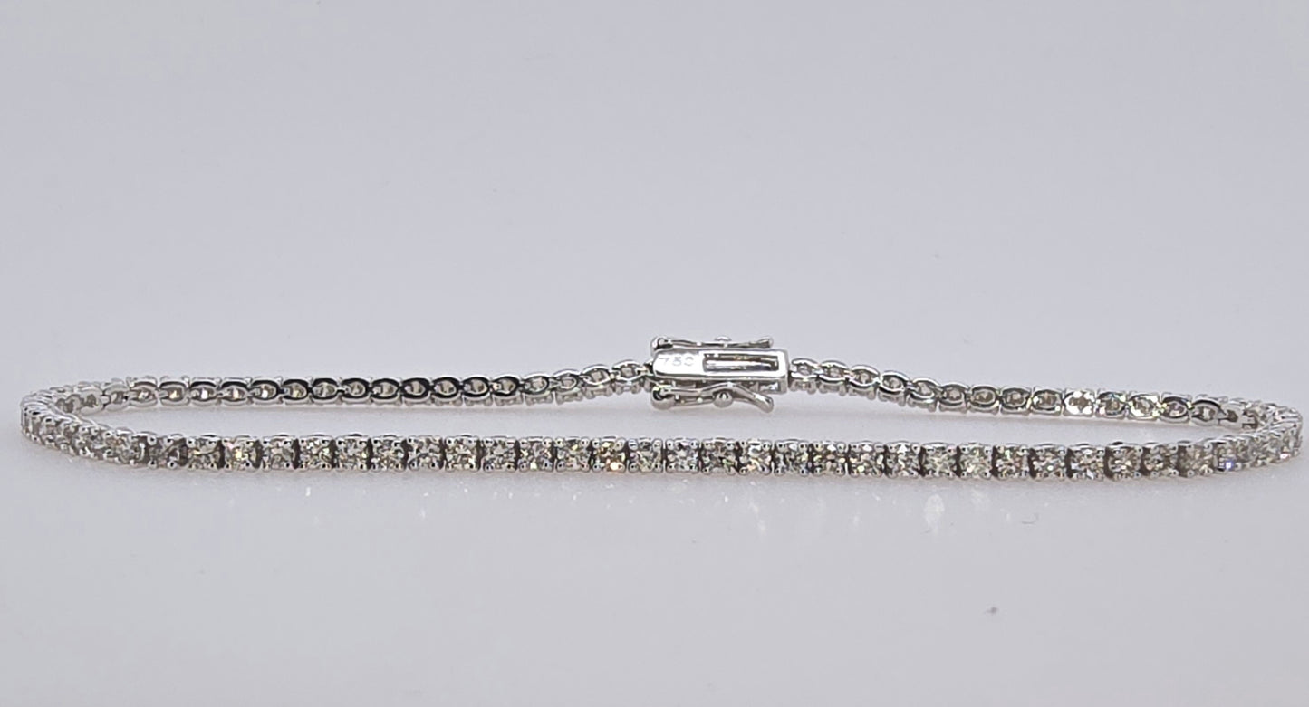 18CT WHITE GOLD 4 CLAW 18CM DIAMOND TENNIS BRACELET