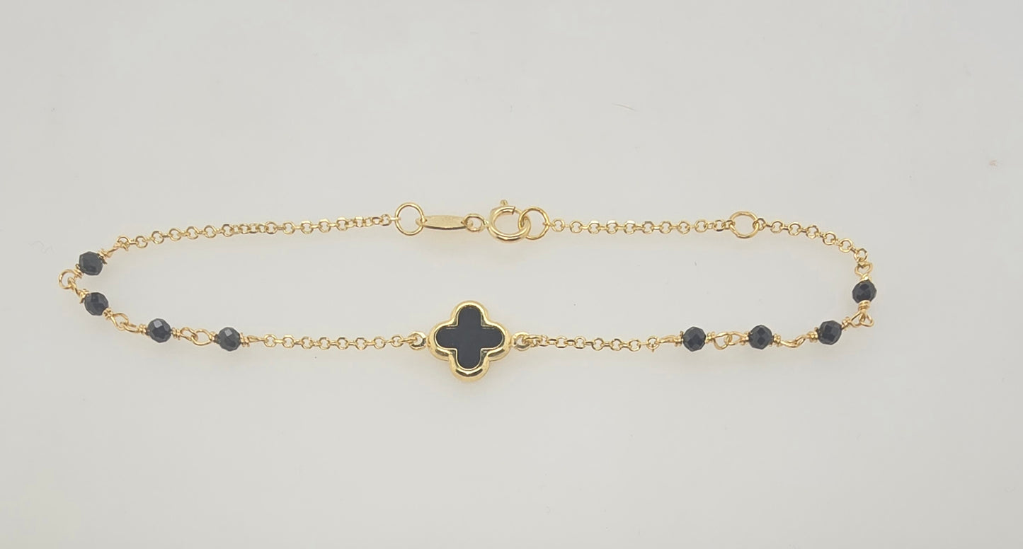 9CT YELLOW GOLD IMPORTED 9MM ONYX CLOVER AND 2.5MM BALL BRACELET.