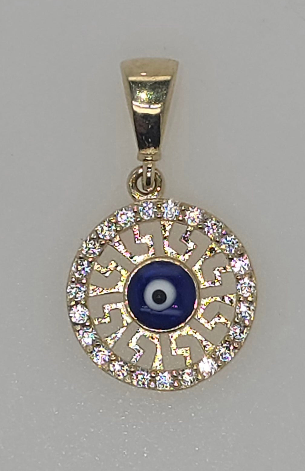 9CT YELLOW GOLD IMPORTED 10MM EVIL EYE PENDANT.