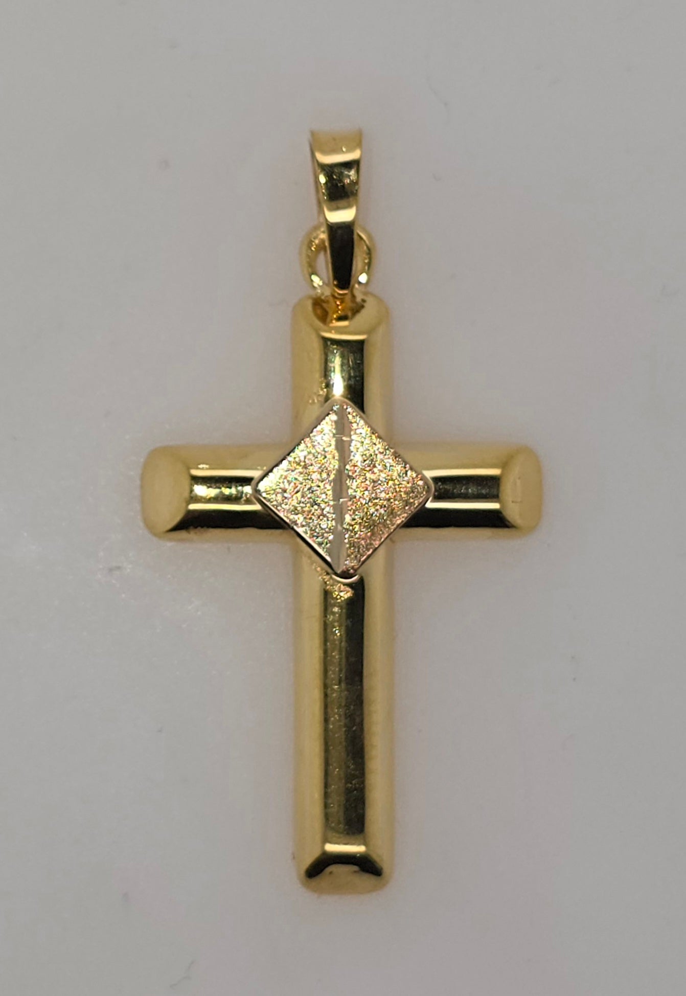 18CT THREE TONE IMPORTED 30MM X 20MM CROSS.