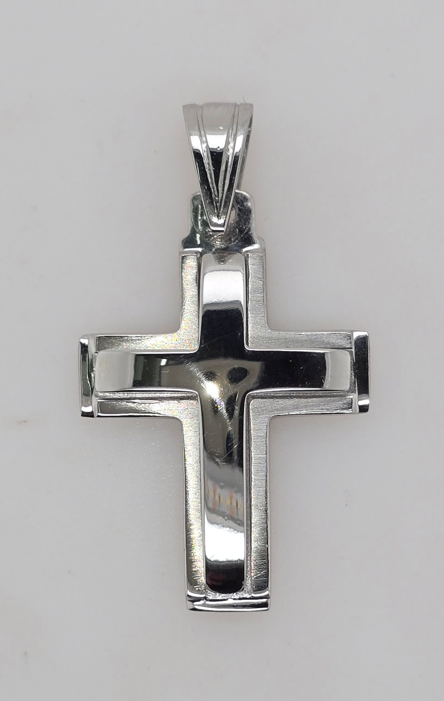 18CT WHITE GOLD SOLID 30MM X 20MM CROSS WITH RAISED CENTER.