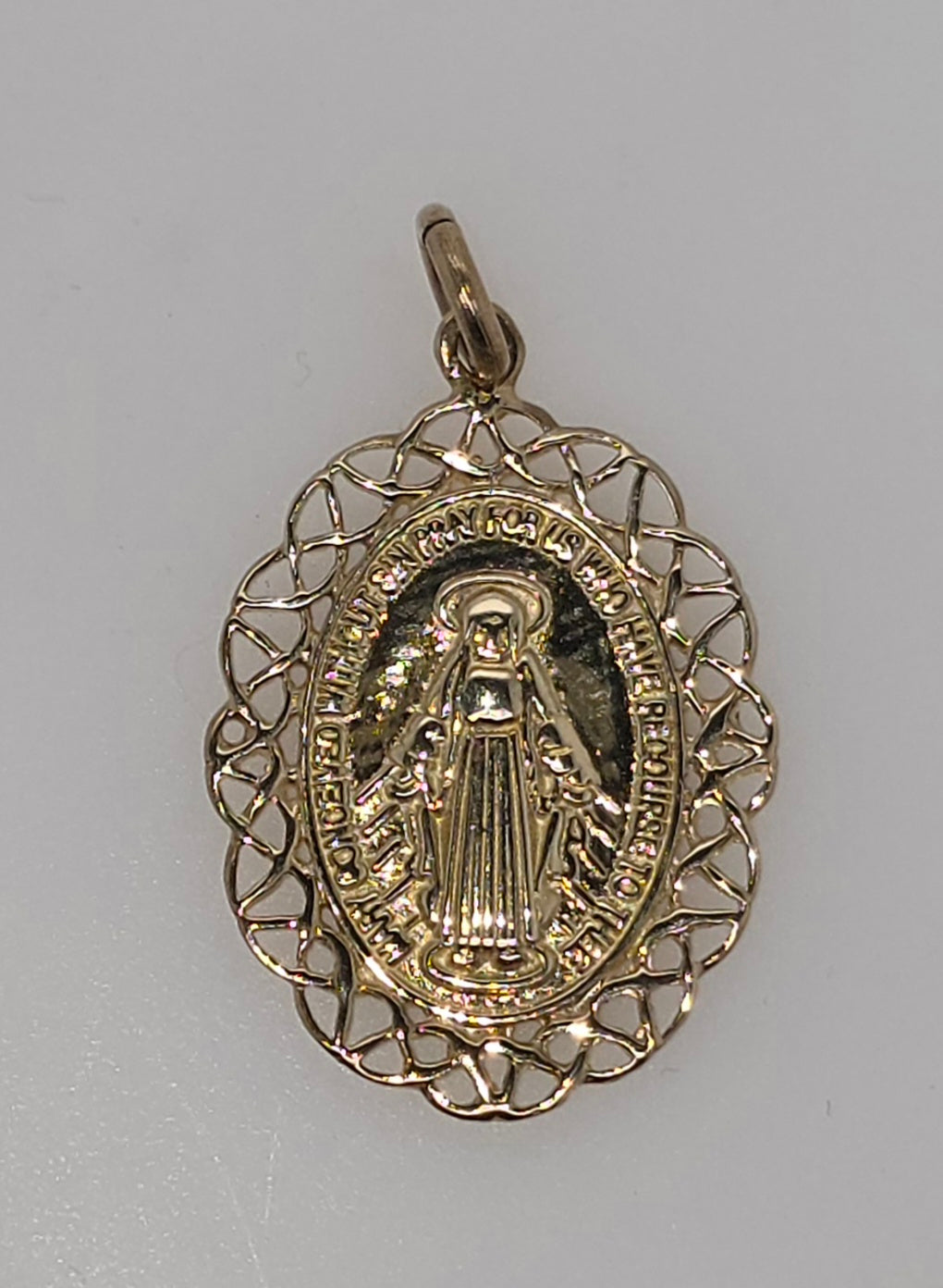 9CT YELLOW GOLD IMPORTED MIRACULOUS MADONNA PENDANT.