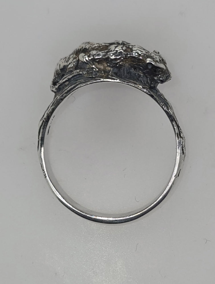 STERLING SILVER CLAW SET 7 X 5MM CUT OVAL GARNET RING.