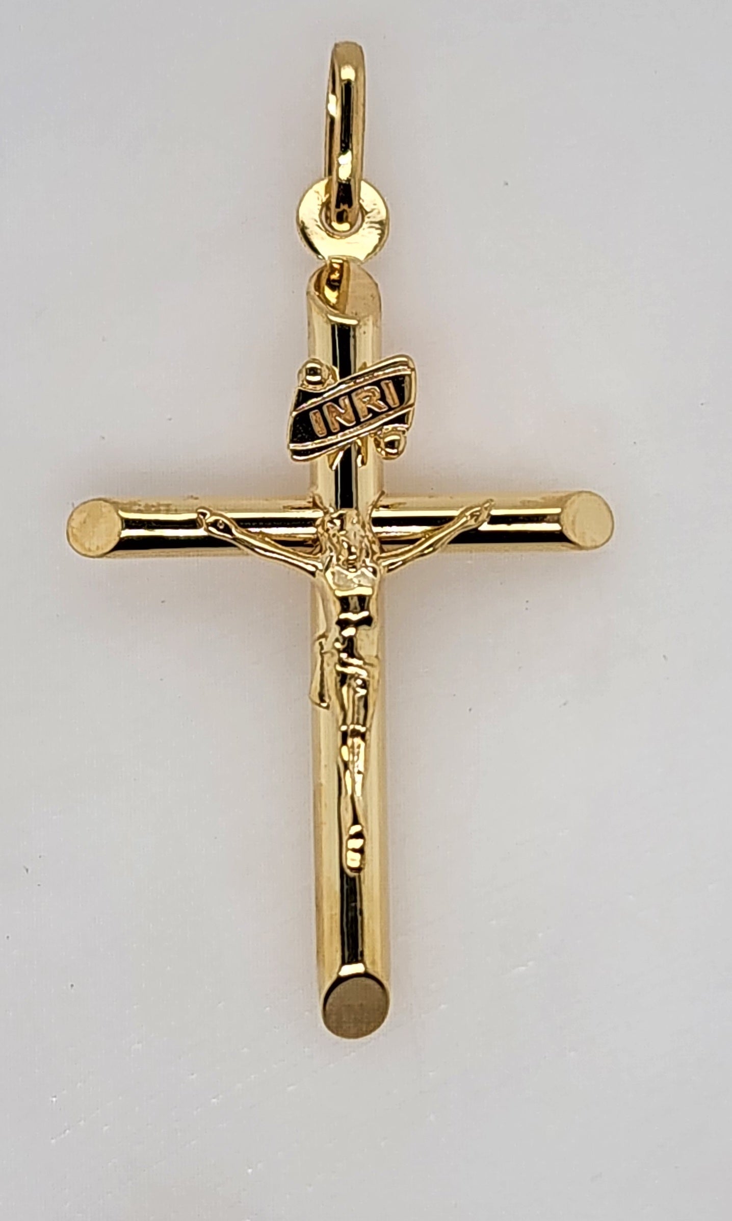 9CT YELLOW GOLD IMPORTED ROUND TUBE 32MM X 22MM CRUCIFIX PENDANT.