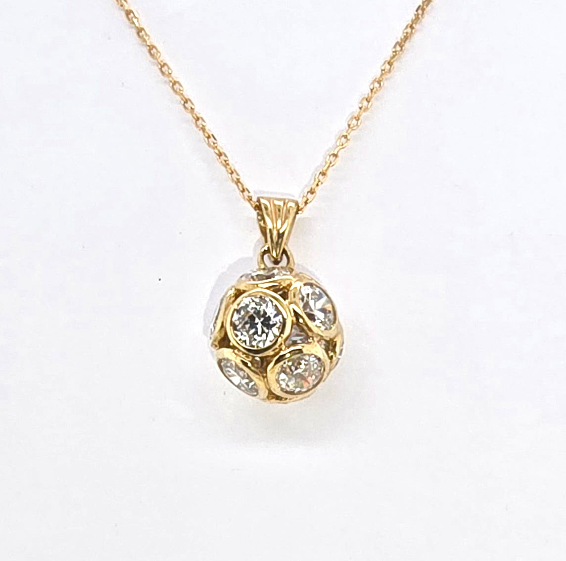 9CT YELLOW GOLD CUBIC ZIRCONIA BEZEL SET BALL PENDANT