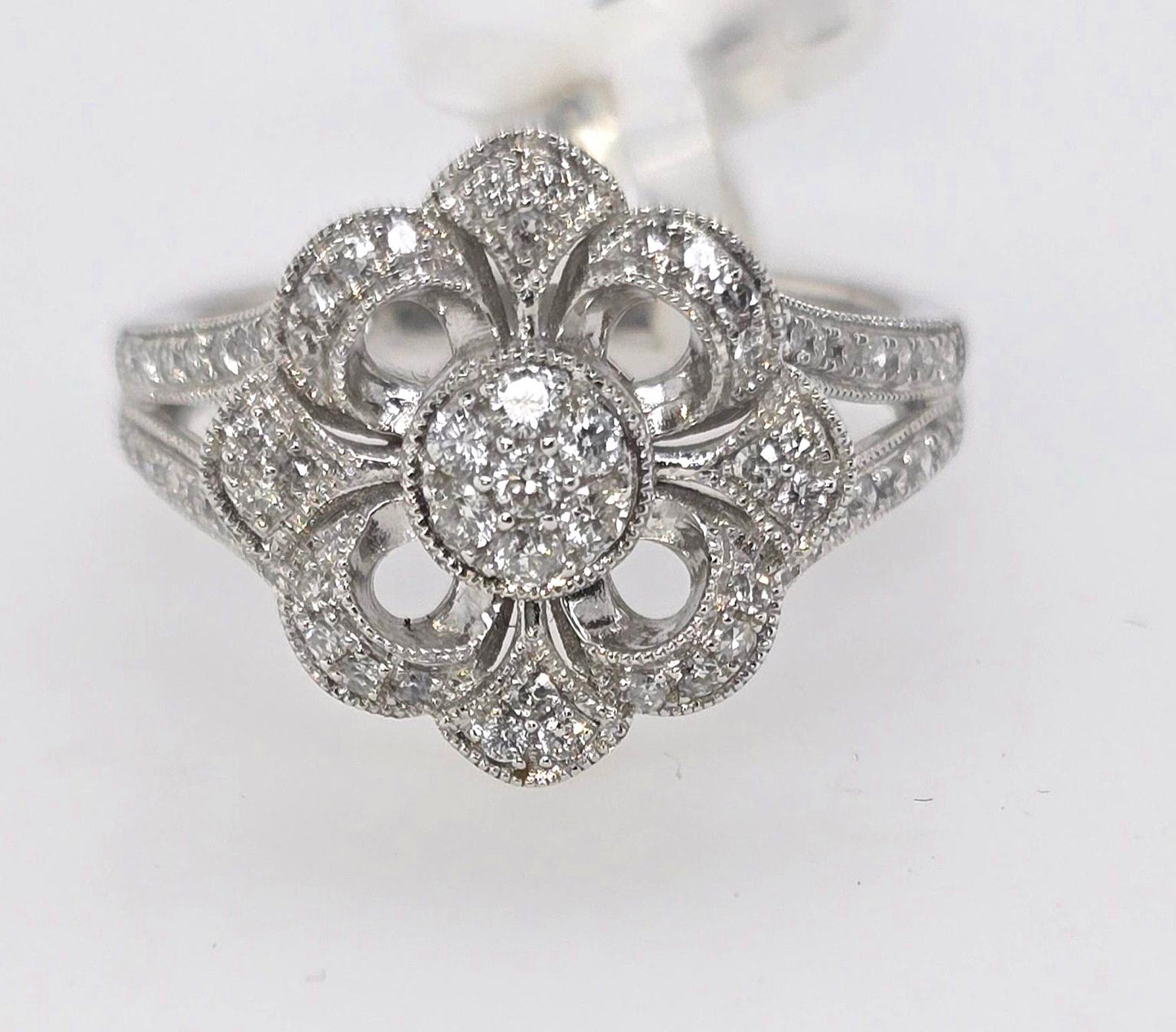 9CT WHITE GOLD DIAMOND FLOWER RING