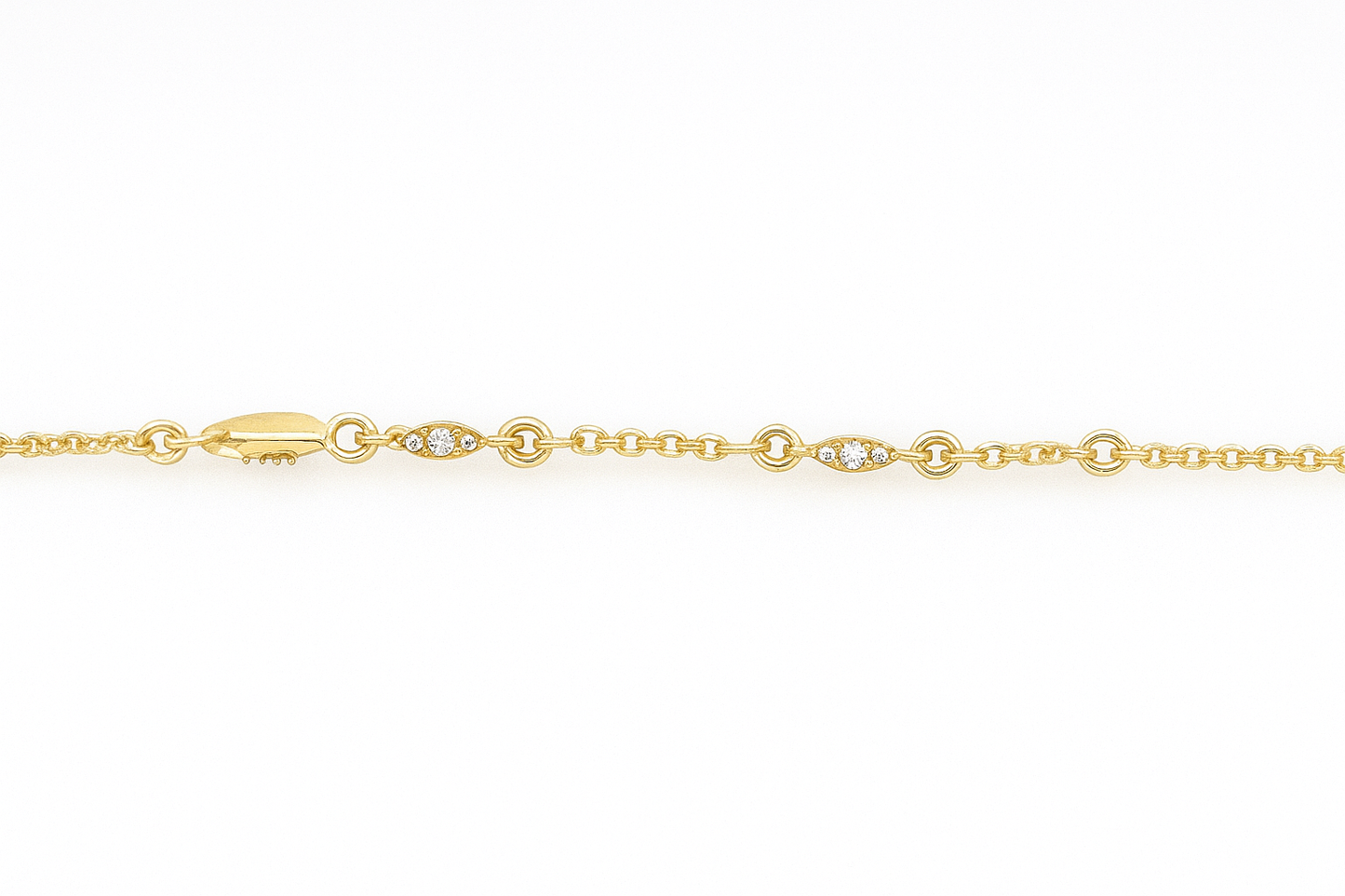 9CT YELLOW GOLD 16-18CM IMPORTED 7 5X1.8MM PAVE SET CUBIC ZIRCONIA MARQUISE SHAPE CHARMS BRACELET.