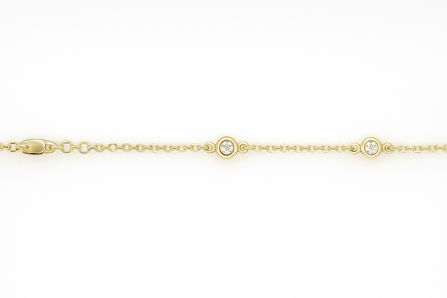 9CT YELLOW GOLD 16-18CM IMPORTED 4 X 3.7MM BEZEL CUBIC ZIRCONIA BRACELET