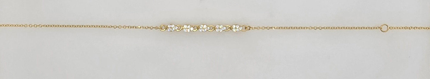 9CT YELLOW GOLD 16-18CM IMPORTED CUBIC ZIRCONIA 5 X TEAR DROP CHARM BRACELET.