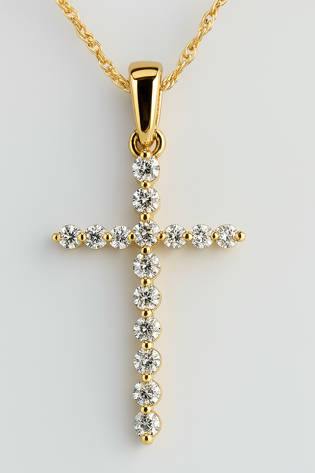 10CT YELLOW GOLD CLAW SET DIAMOND CROSS WITH CHAIN.