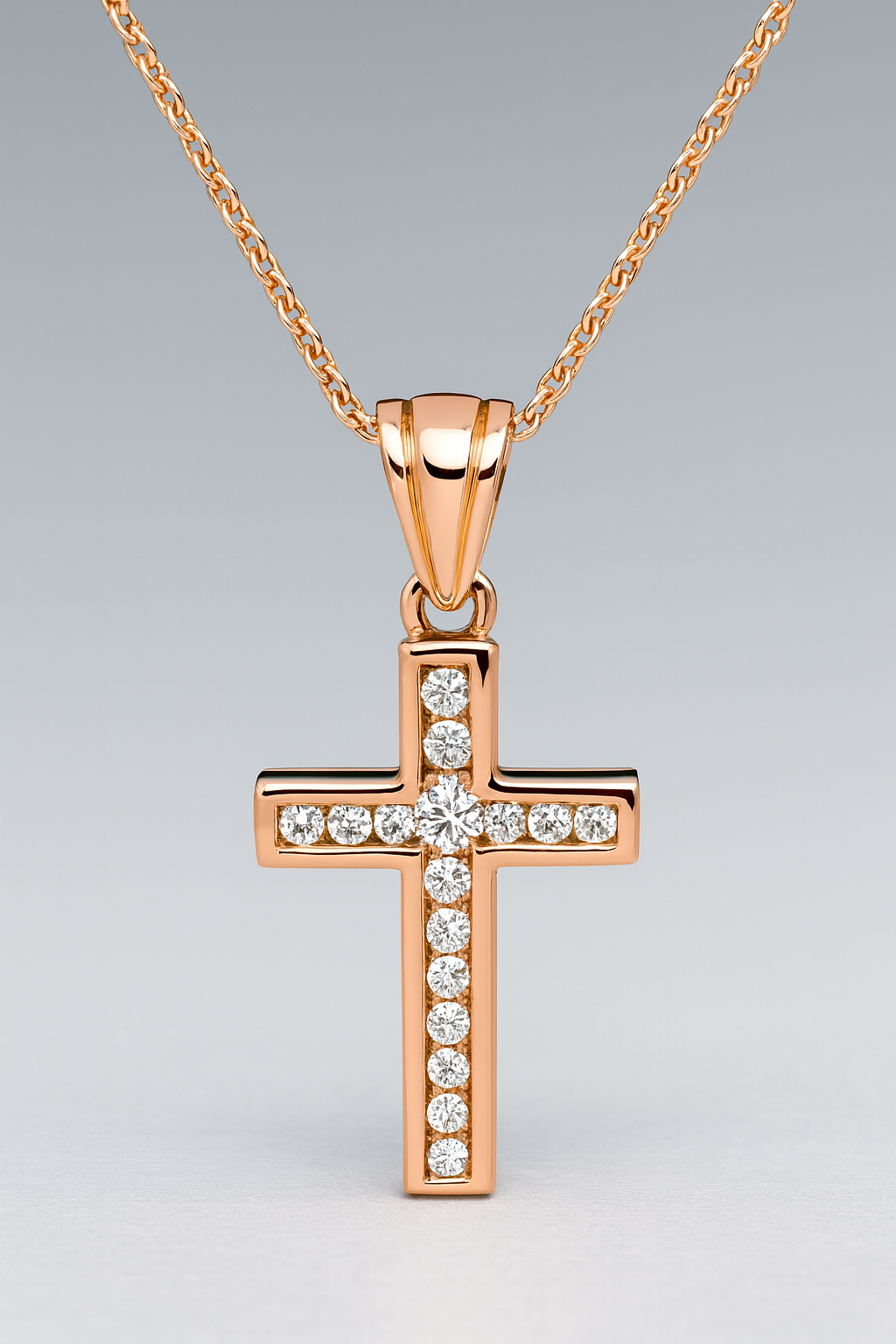 9CT ROSE GOLD CHANNEL SET DIAMOND CROSS.