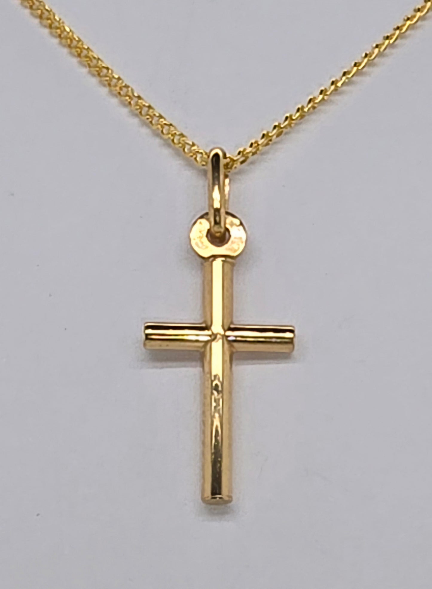 9CT YELLOW GOLD CROSS.