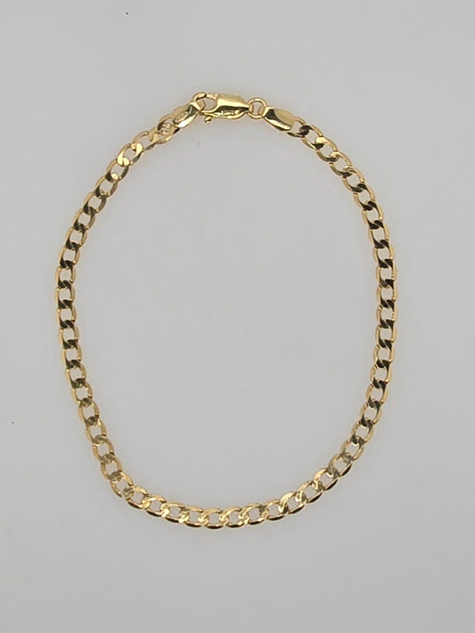 9CT YELLOW GOLD CURB BRACELET.