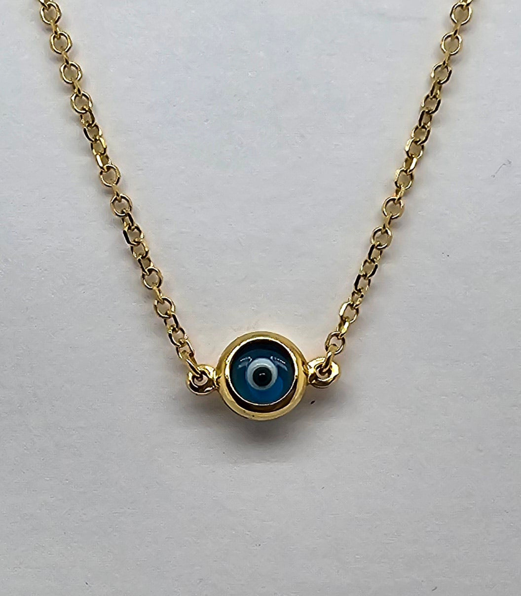 9CT YELLOW GOLD 43CM TRACE CHAIN WITH EVIL EYE.