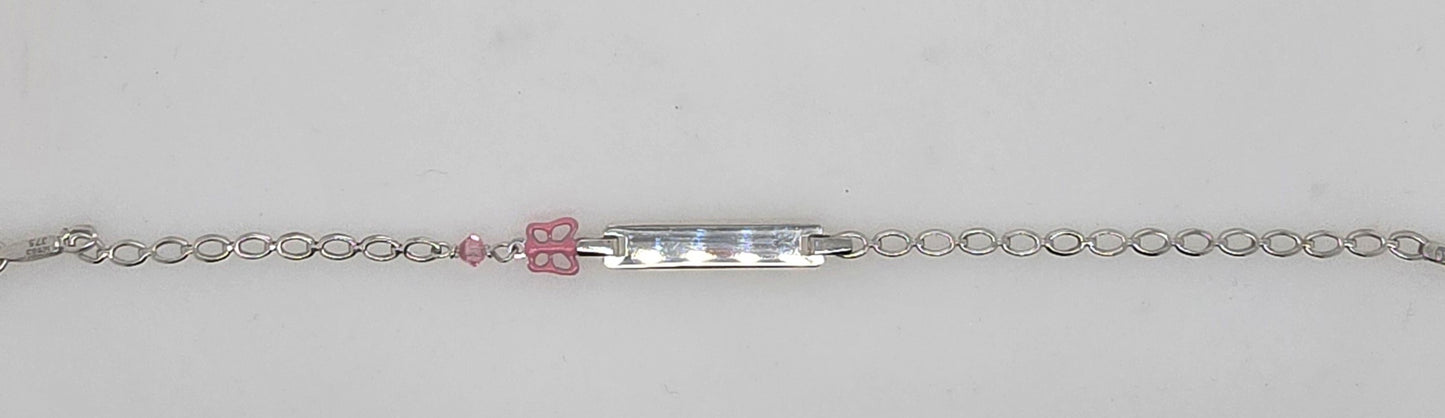 9CT WHITE GOLD 15CM ID BRACELET WITH PINK BUTTERFLY CHARM.