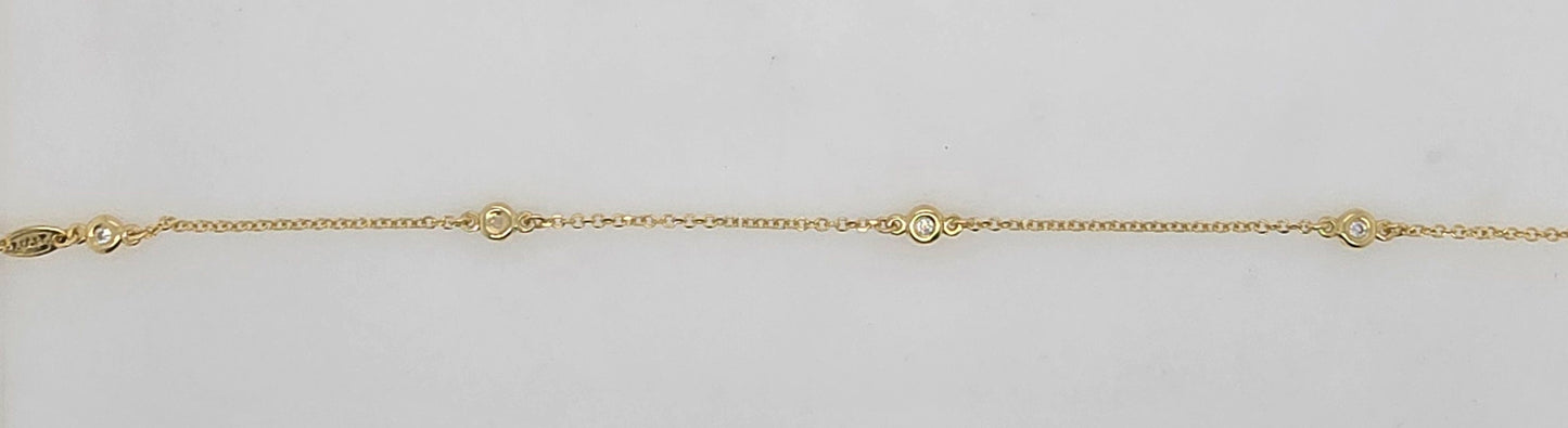 9CT YELLOW GOLD 16-18CM IMPORTED 4 X 3.7MM BEZEL CUBIC ZIRCONIA BRACELET.