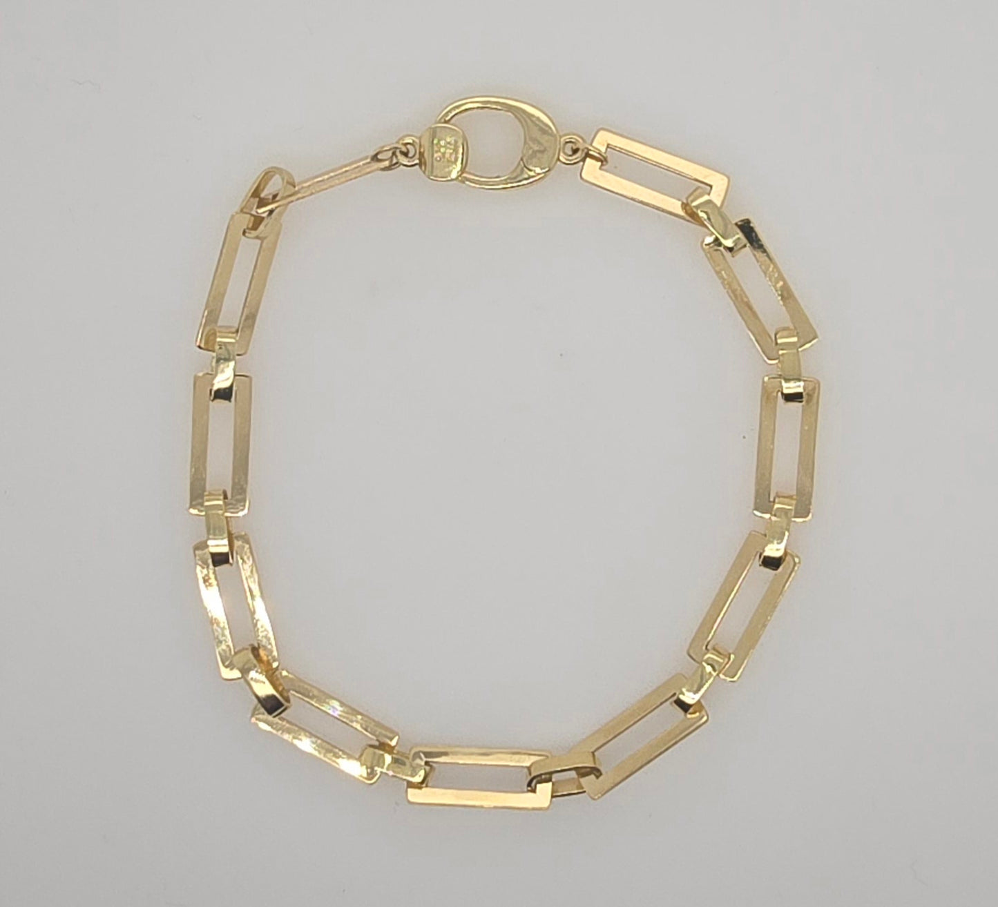 9CT YELLOW GOLD IMPORTED 19CM 13MM X 5.2MM RECTANGLE LINK BRACELET 5.687GRAMS.