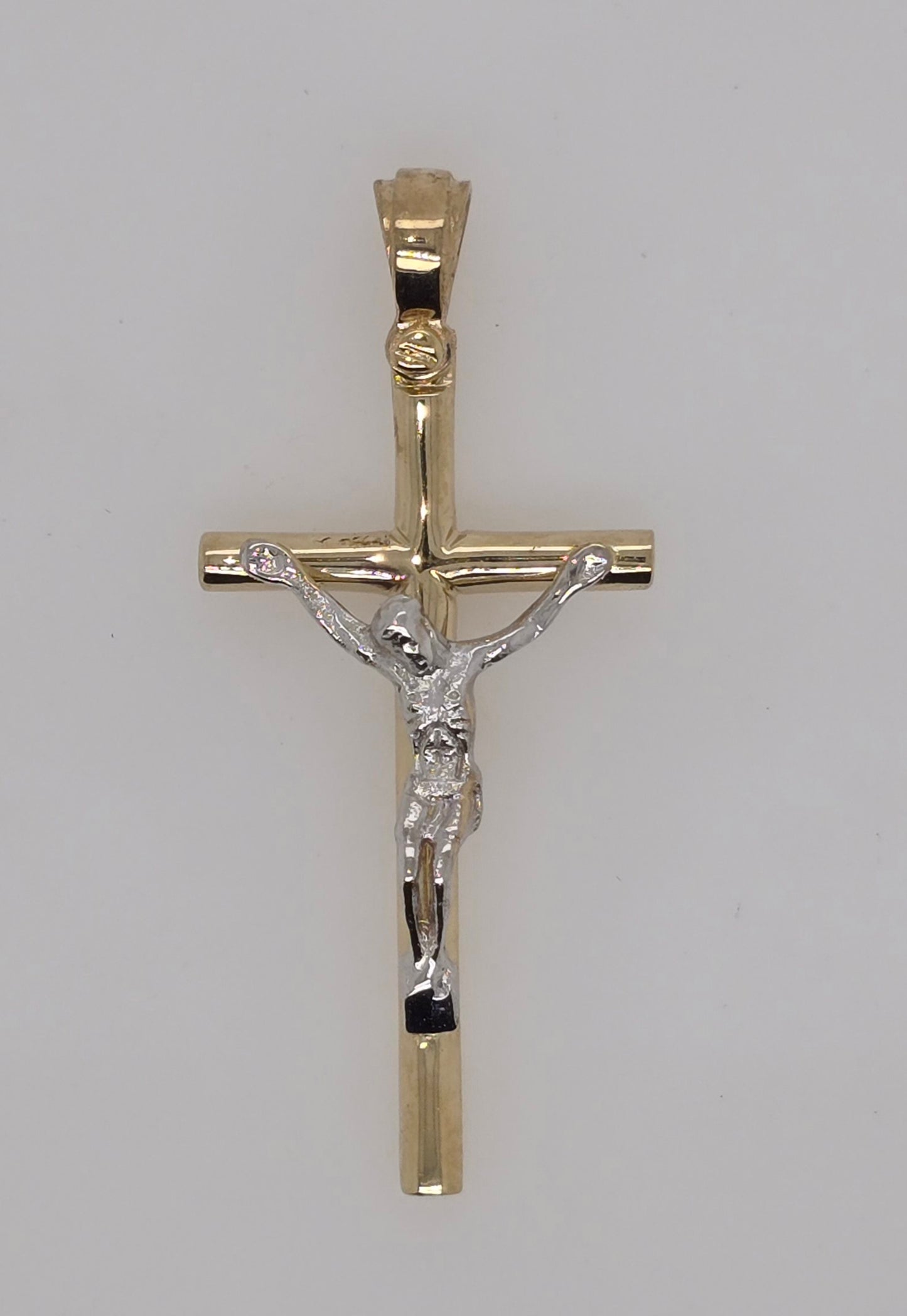 9CT TWO TONE IMPORTED 31MMX 16MM  CRUCIFIX.