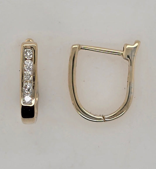 9CT YELLOW GOLD DIAMOND OVAL HUGGIE EARRINGS.