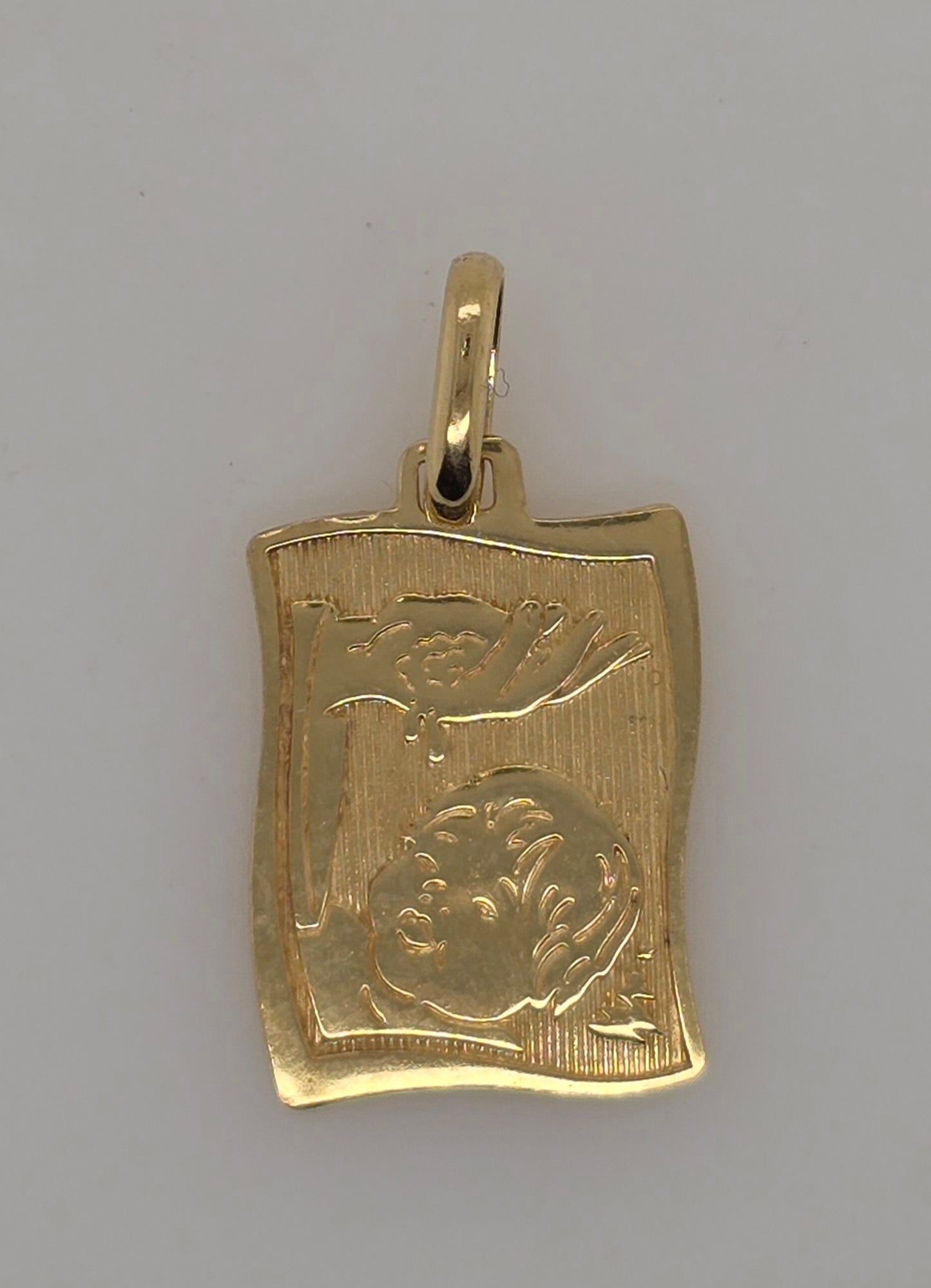 18CT YELLOW GOLD IMPORTED 17MM X 13MM BAPTISAM PENDANT.