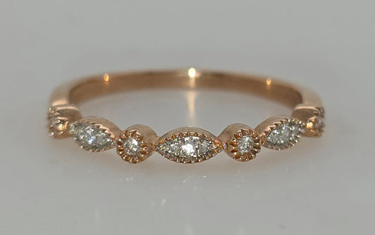 9CT ROSE GOLD  DIAMOND RING.