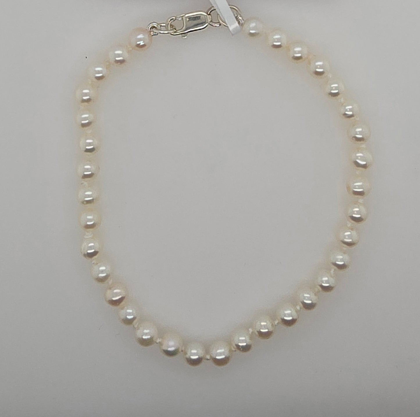 FRESHWATER 4.5-5MM PEARL 19CM BRACELET WITH STERLING SILVER CLASP.