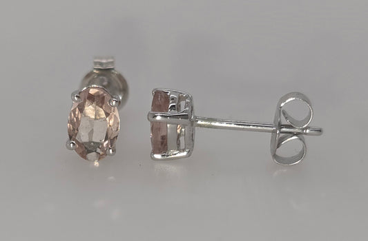 9CT WHITE GOLD OVAL PINK TOURMALINE STUD EARRINGS.