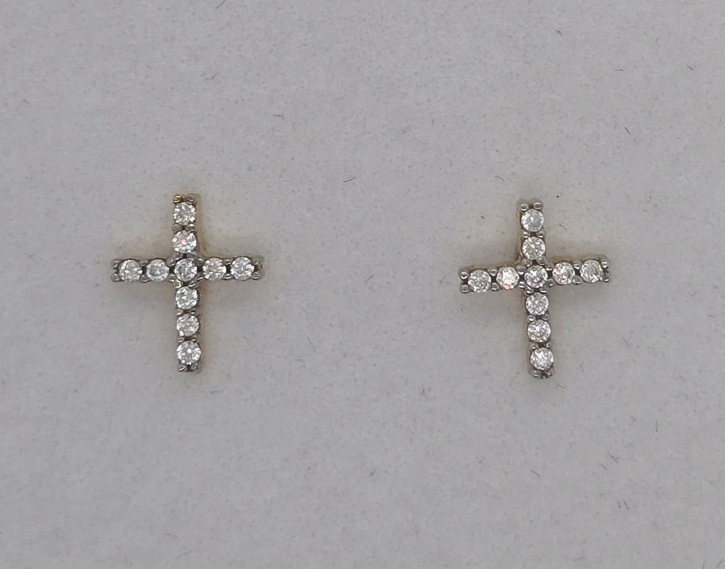 9CT YELLOW GOLD IMPORTED 8MM X 6.7MM CUBIC ZIRCONIA CROSS STUD EARRINGS.