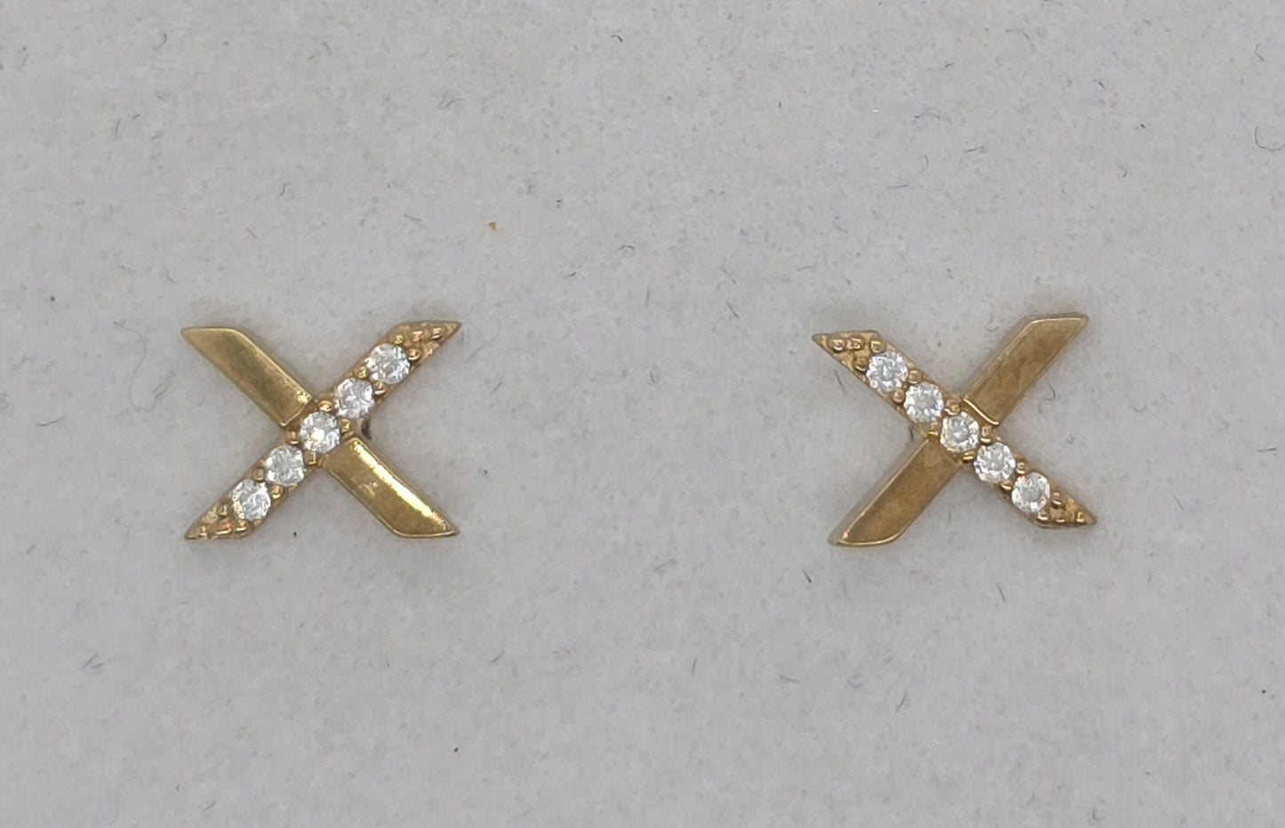 9CT YELLOW GOLD IMPORTED CUBIC ZIRCONIA 7MM X 5MM FANCY X EARRINGS.
