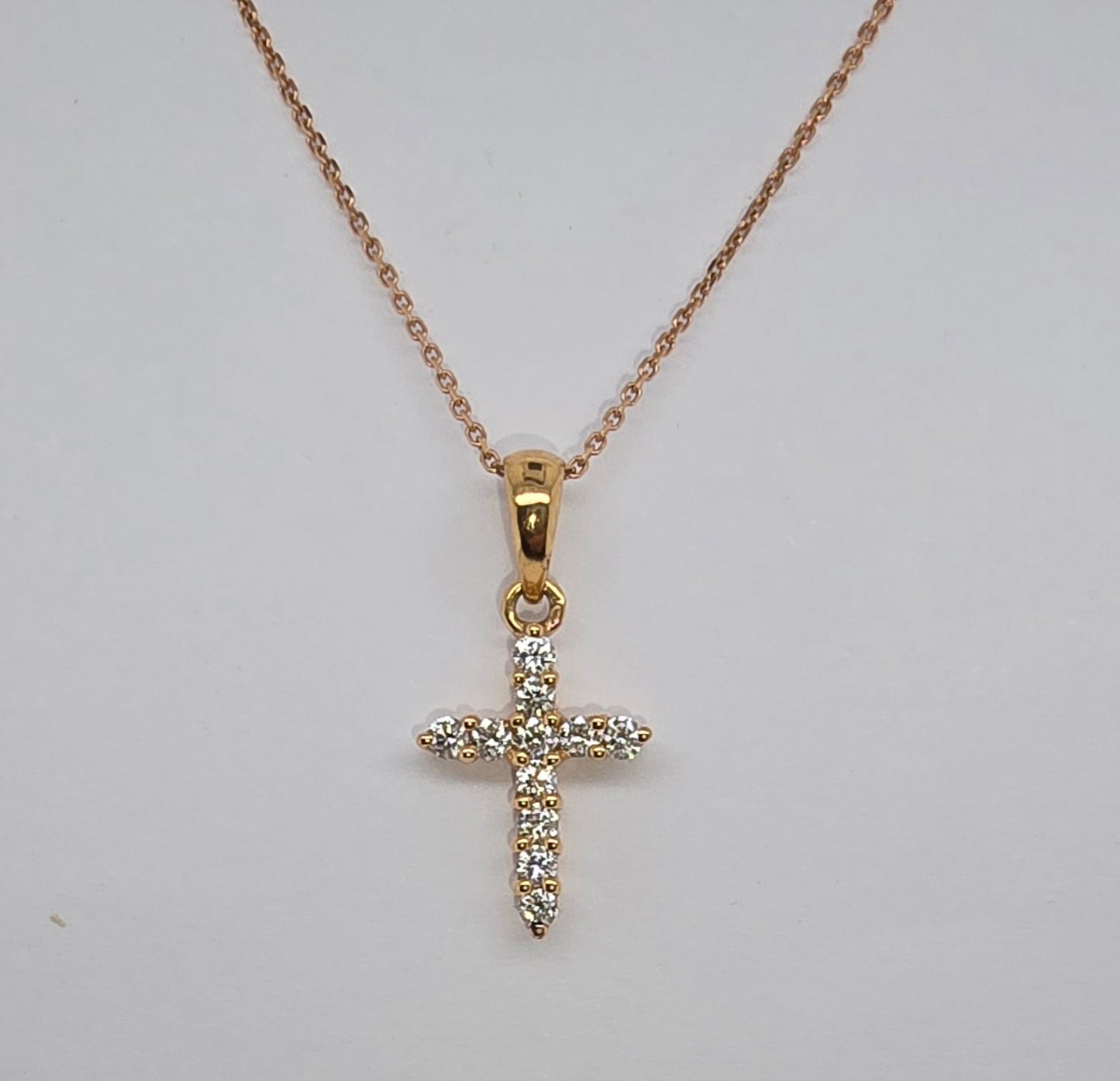 18CT ROSE GOLD CLAW SET DIAMOND CROSS PENDANT