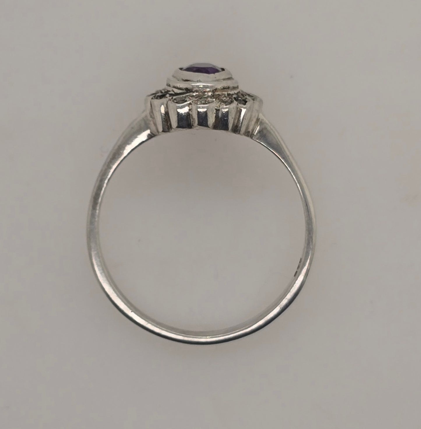 STERLING SILVER BEZEL SET 6 X 4MM AMETHYST RING.