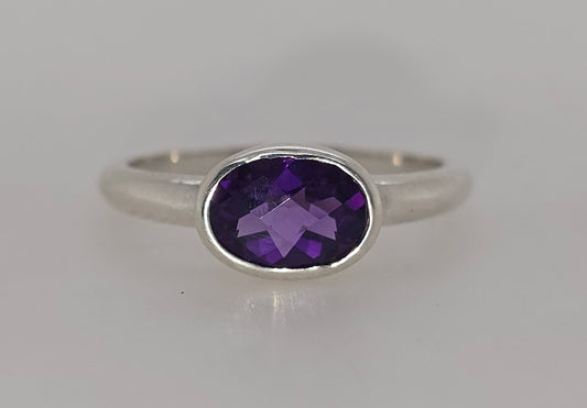 STERLING SILVER BEZEL SET 8 X 6 OVAL AMETHYST RING