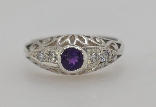 STERLING SILVER BEZEL SET 4.2MM ROUND AMETHYST  RING.