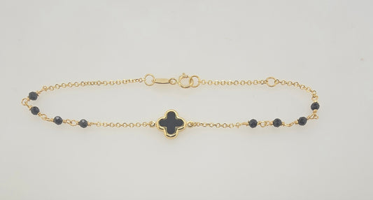 9CT YELLOW GOLD IMPORTED 9MM ONYX CLOVER AND 2.5MM BALL BRACELET.