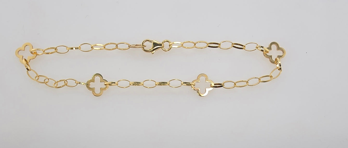 9CT YELLOW GOLD IMPORTED 4 X 7MM OPEN CLOVER ON OVAL LINK 18CM BRACELET.