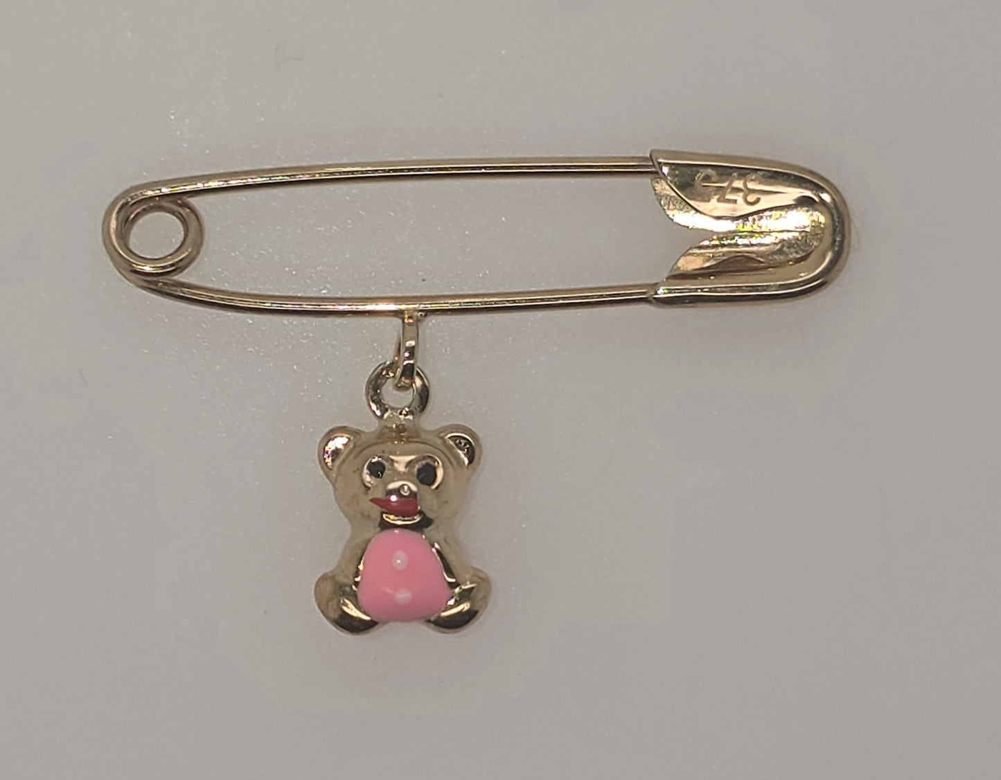 9CT YELLOW GOLD IMPORTED BABY PIN WITH PINK ENAMEL TEDDY.