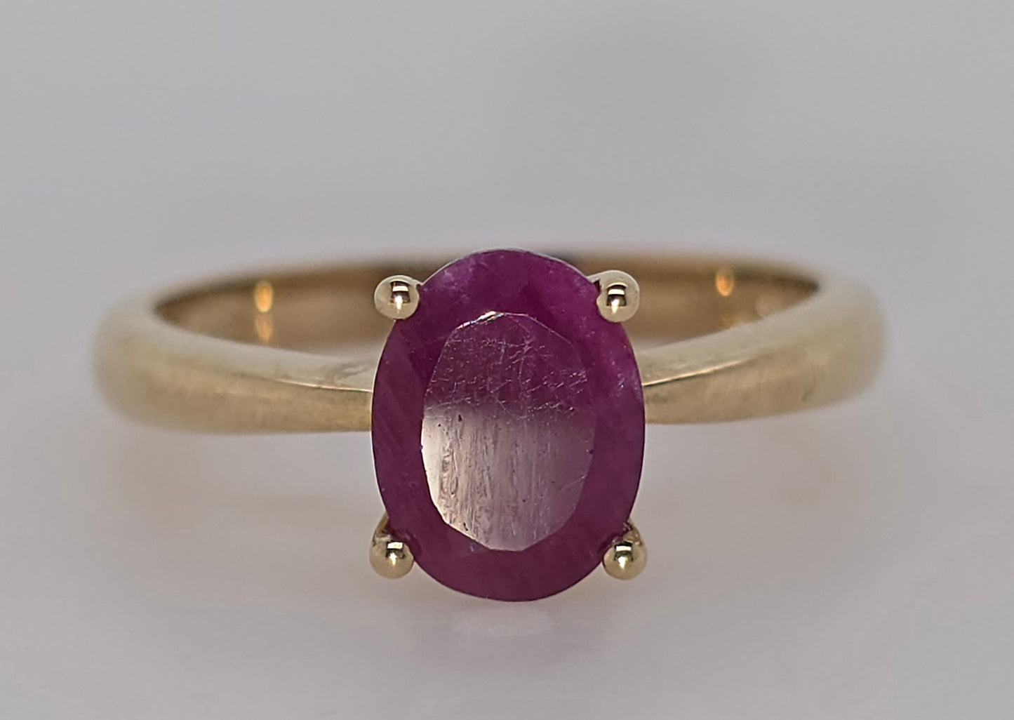 9CT YELLOW GOLD 4 CLAW SET OVAL 8X6MM 1.6CT RUBY RING.
