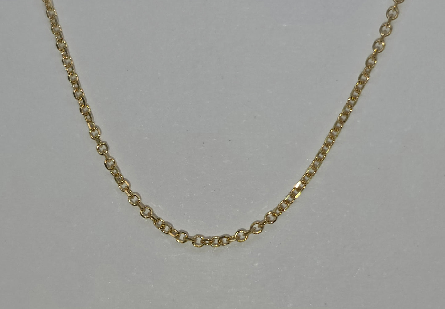 9CT YELLOW GOLD IMPORTED 45CM FINE TRACE CHAIN .7GRAMS.