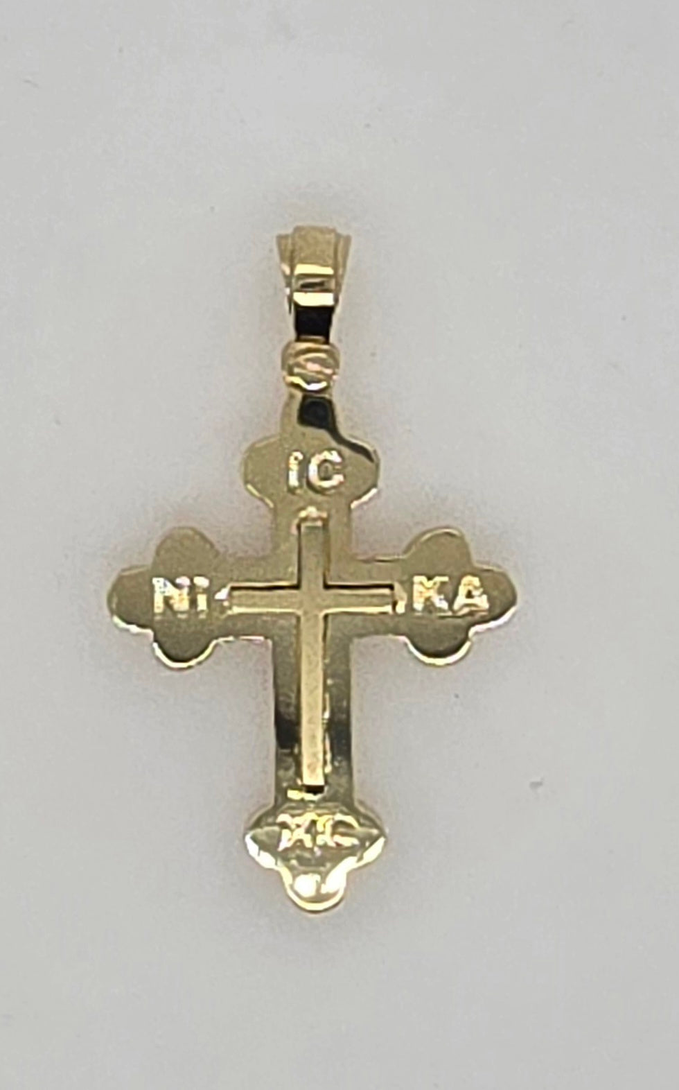 9CT YELLOW GOLD IMPORTED 25MM X 19MM CROSS PENDANT.