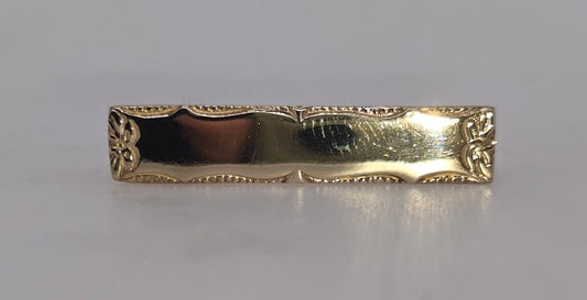 9CT YELLOW GOLD SOLID 31.6MM X 6.5MM FANCY EDGE BROOCH 3GRAMS.