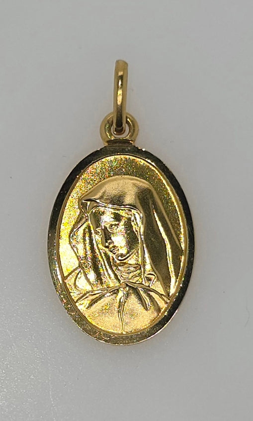 18CT YELLOW GOLD IMPORTED 18MM X 14MM OVAL SOLID MARY CHARM.