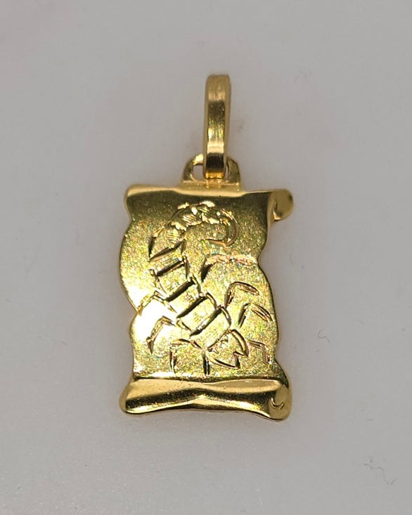 18CT YELLOW GOLD IMPORTED PENDANT WITH ENGRAVED SCORPION.