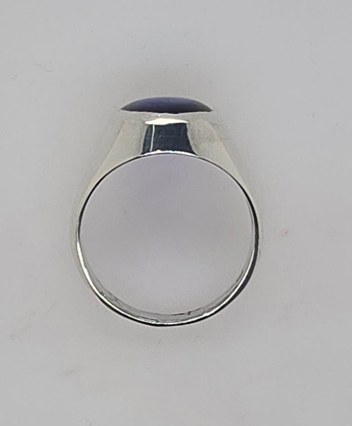 STERLING SILVER OVAL CREATED BLUE SPINEL RING.
